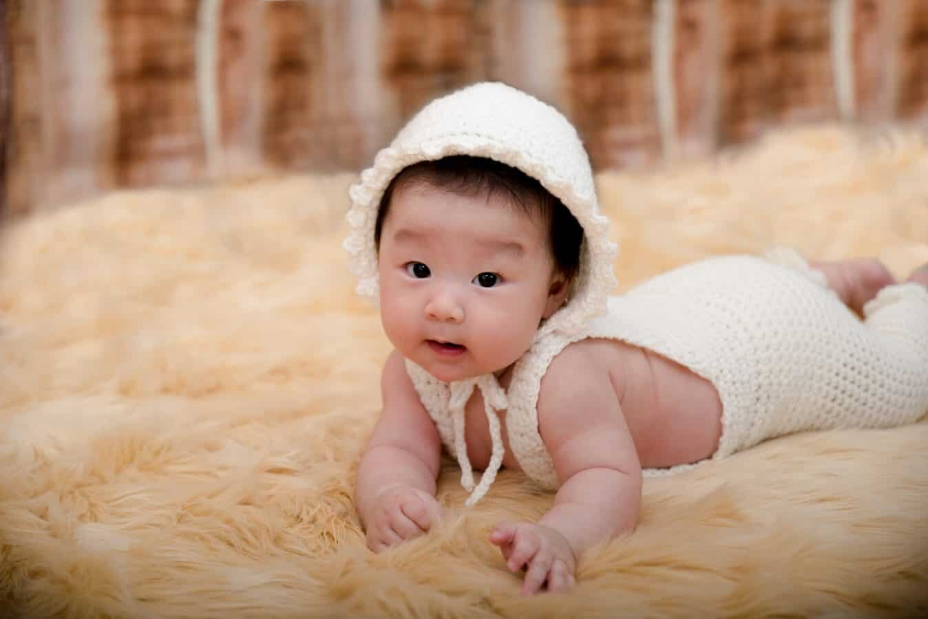 100 Days Baby Girl Belly Down in Ivory Crocheted Bonnet and Romper
