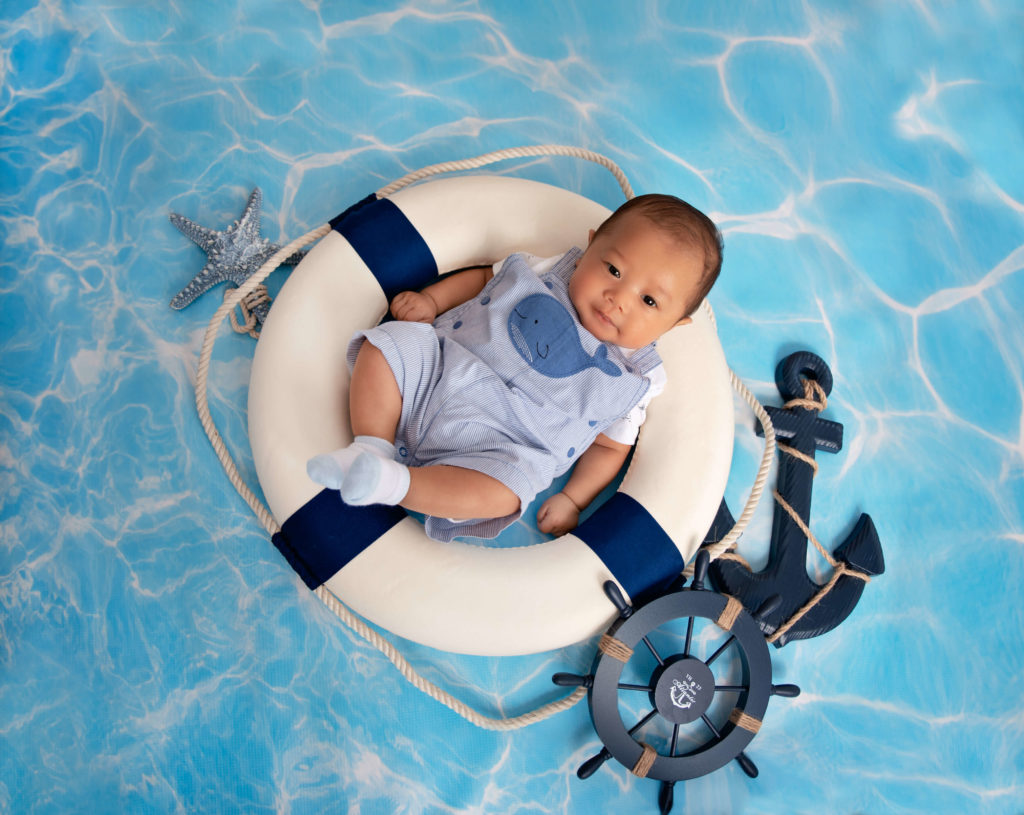 100 days baby boy on lifesaver welcome aboard nautical theme