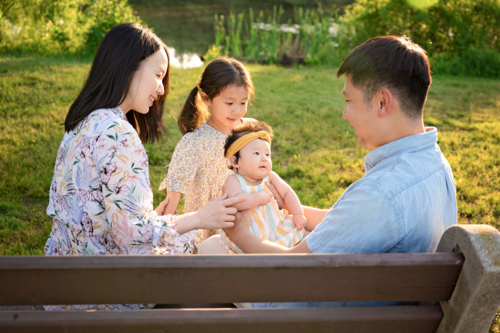 Family of 4 outdoor candid captures Davidson's Mill Pond Park North Brunswick NJ sunset hours